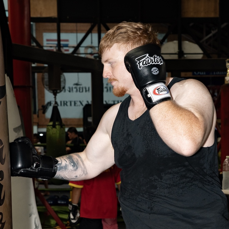 Heavy bag training with proper gloves for full power